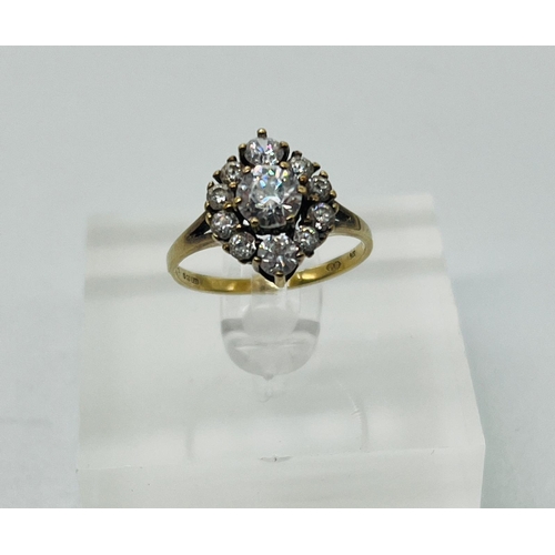 521 - A 9ct gold, marked 375, fashion ring CZ cluster style, approximate size M