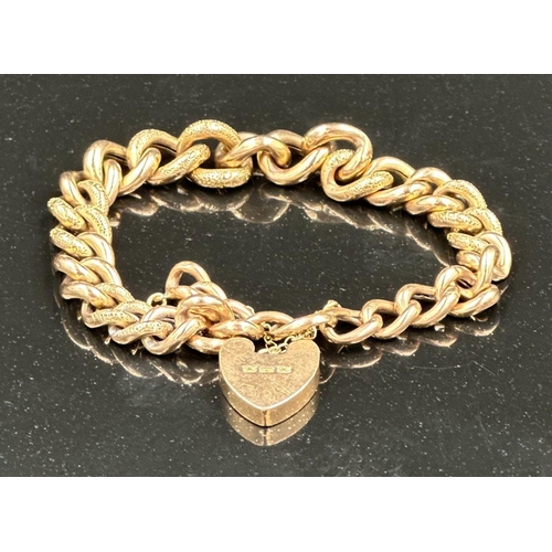 535 - A 9ct gold bracelet with a heart shaped fastener, approximate total weight 14.4g