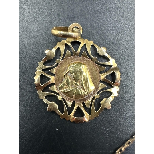 542 - An 18ct gold pendant of Our Lady (Approximate weight 1.7g) and a 9ct gold chain (Approximate weight ... 