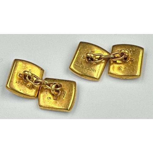 548 - A pair of 18ct gold and platinum Gents cuff links with mother of pearl decoration in the style of di... 