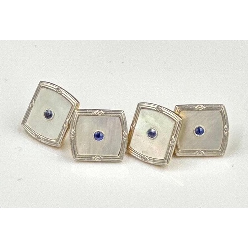 548 - A pair of 18ct gold and platinum Gents cuff links with mother of pearl decoration in the style of di... 