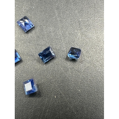 557 - A set of six small square sapphires