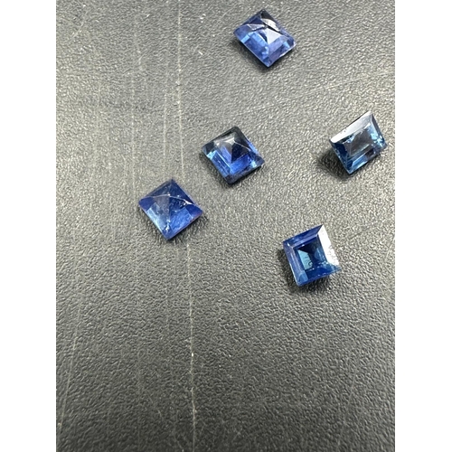 557 - A set of six small square sapphires