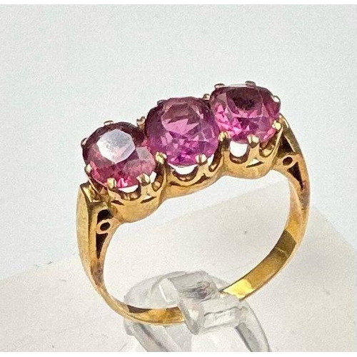 559 - A pink three stone ring, size L, approximate weight 3.5g