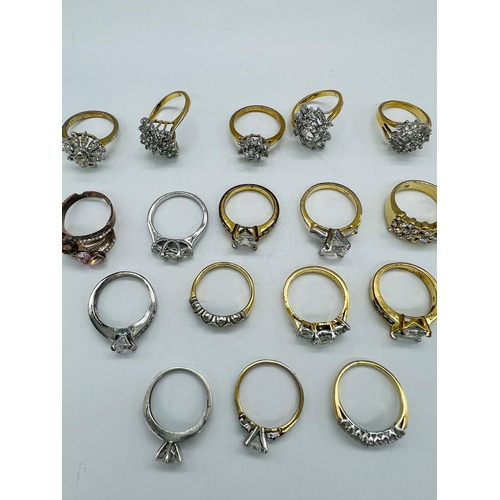 561 - A selection of costume jewellery to include a wide range of white stone fashion rings, a silver line... 