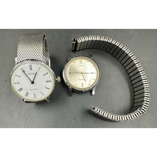 596 - Two gentleman wrist watches, an Action Quartz and Timex AF