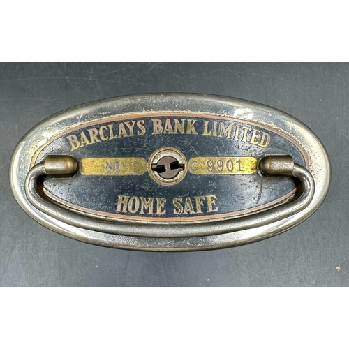 612 - A Vintage Barclays Bank Limited Home Safe with coins but no key. Has not been opened by Windsor Auct... 