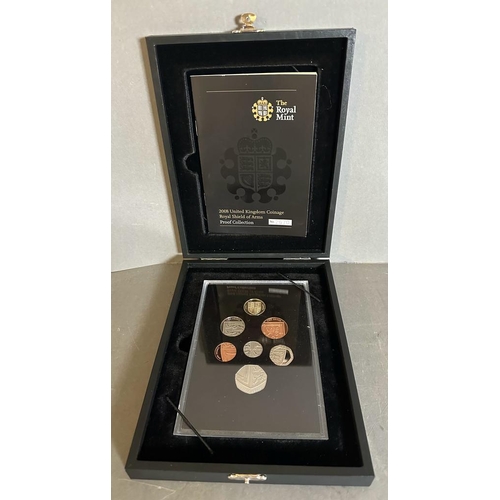 617 - Royal Mint: Year 2000 Executive Coin Collection and the 2008 United Kingdom Coinage Royal Shield of ... 