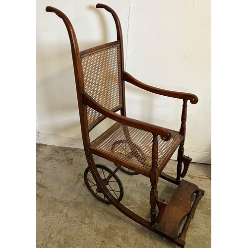 62 - A Victorian Bergere wheel chair