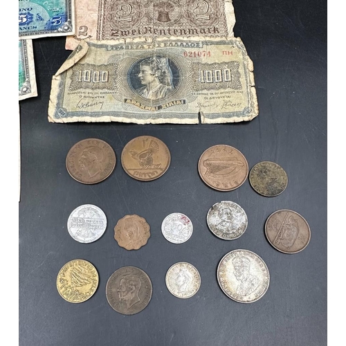 637 - A small selection of coins, and banknotes including three WWII French Allied Occupation currency.