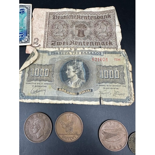 637 - A small selection of coins, and banknotes including three WWII French Allied Occupation currency.