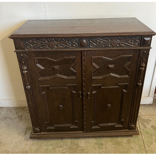 67 - Gothic revival side cabinet with carved panelled front (A/F no back)