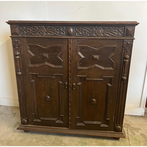 67 - Gothic revival side cabinet with carved panelled front (A/F no back)