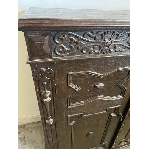 67 - Gothic revival side cabinet with carved panelled front (A/F no back)