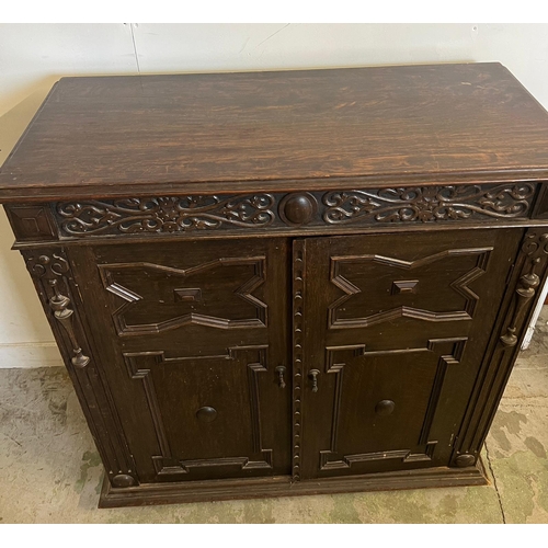 67 - Gothic revival side cabinet with carved panelled front (A/F no back)