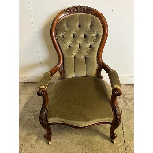 68 - A Victorian open arm chair, spoon button back on cabriole legs