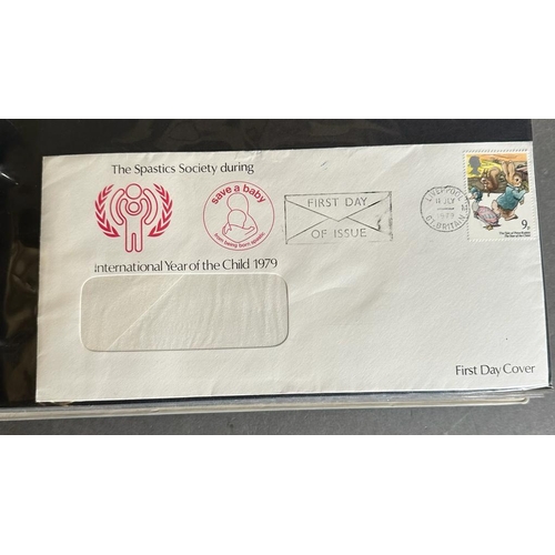 694 - A stamp collection to include three albums of First Day Covers to include many Welsh Rugby, along wi... 