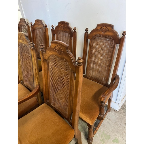 70 - Six chairs and two carvers with cane back and velvet seat pads