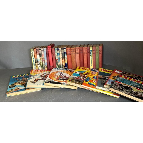 704 - A selection of books and annuals to include Just William, Biggles and Valiand