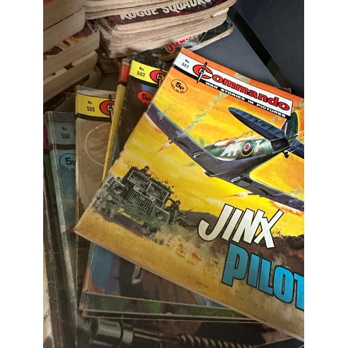 705 - A large selection of pictures library comic books to include Commands, Battle and Air Ace, various c... 