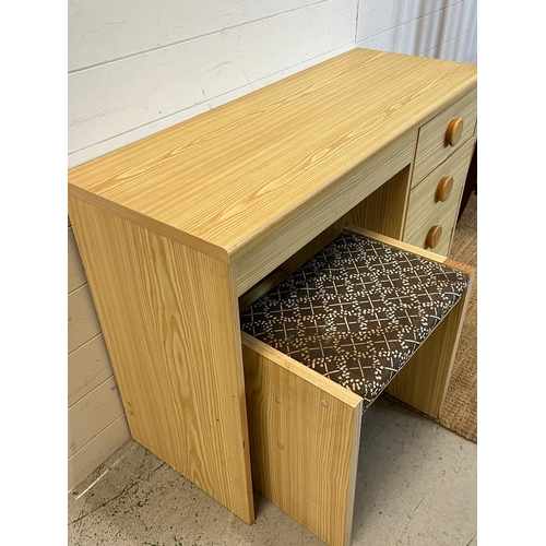 71 - An 80's pine effect dressing table with stool (H70cm W104cm D38cm)