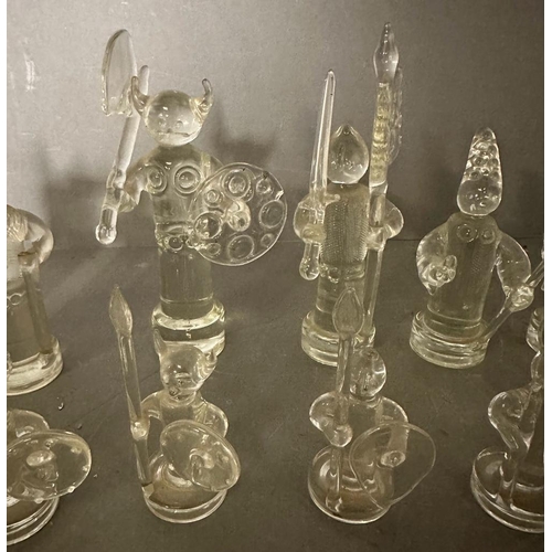 717 - A selection of glass chess pieces, thirty one in total some AF