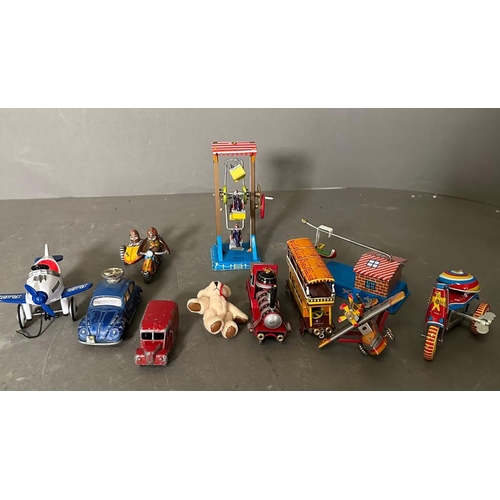 721 - A selection of vintage tin toys and a miniature teddy bear