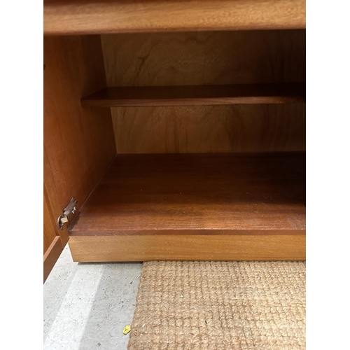 117 - A Mid Century four drawer, two cupboard sideboard by Nathan (H76cm W102cm D45cm)