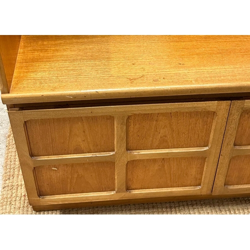 118 - A Mid Century wall cabinet by Nathan, comprising of two door glazed cupboards, two door cupboard und... 