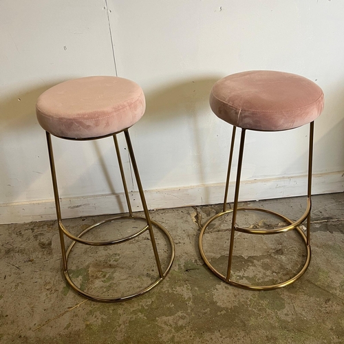 141 - Two velvet topped stools on brass style bases (H74cm Dia34cm)