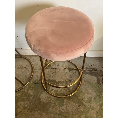 141 - Two velvet topped stools on brass style bases (H74cm Dia34cm)