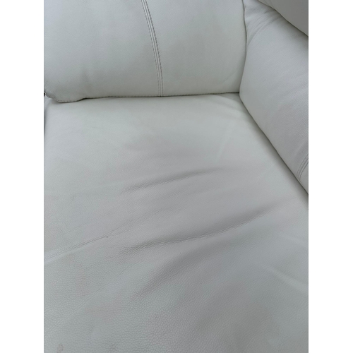 149 - A white leather three seater sofa 212cm x 87cm