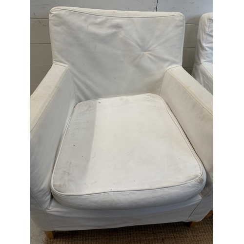 154 - A pair of contemporary arm chairs with removal covers