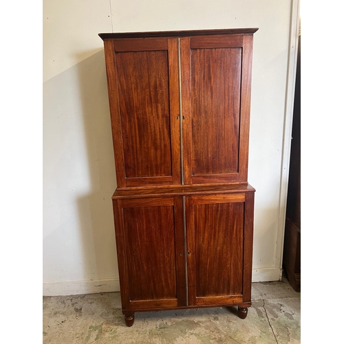 162 - A George IV mahogany bookcase cabinet (Base H96cm W88cm D36cm Top H91cm W89cm D27cm)