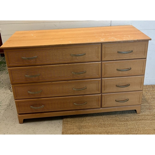 169 - A pine effect bedroom set comprising of two double, one single wardrobe along with a long chest of d... 