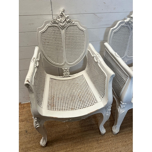 175 - A pair of French painted Bergère arm chairs