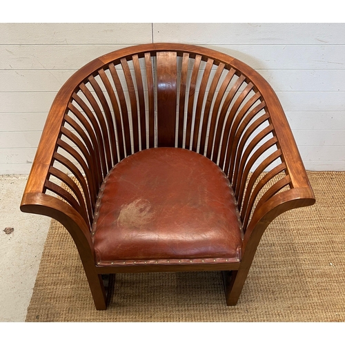 180 - A teak slatted curved round armchair in the style of Hoffman