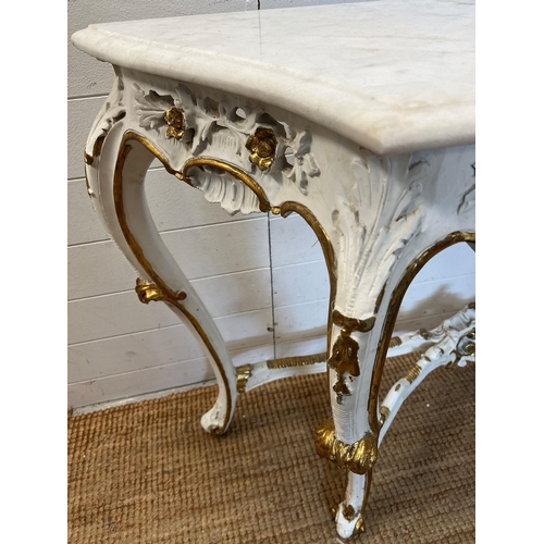 181 - A Rocco style console table with marble shaped top (H84cm W130cm D44cm)