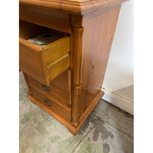 211 - A pine desk or dressing table (H79cm W106cm D46cm)