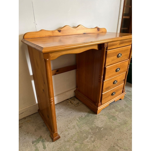 211 - A pine desk or dressing table (H79cm W106cm D46cm)