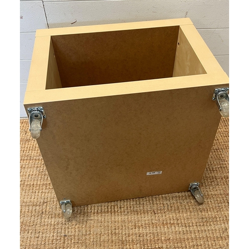 22 - An Ikea cube storage table on wheels (H44cm Sq54cm)