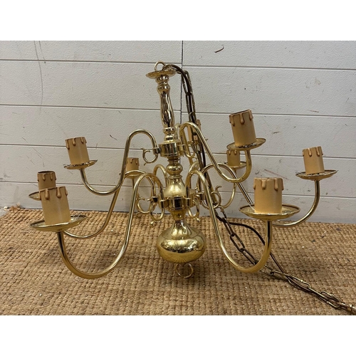 227 - A pair of brass nine arm chandelier ceiling lights