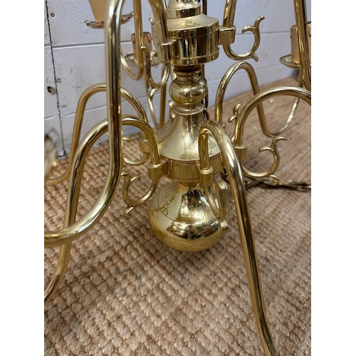 227 - A pair of brass nine arm chandelier ceiling lights