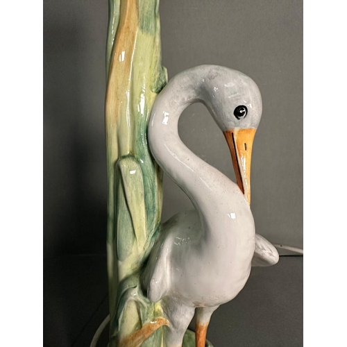 234 - An Art Nouveau style ceramic table lamp of a heron in the reeds (H42cm)