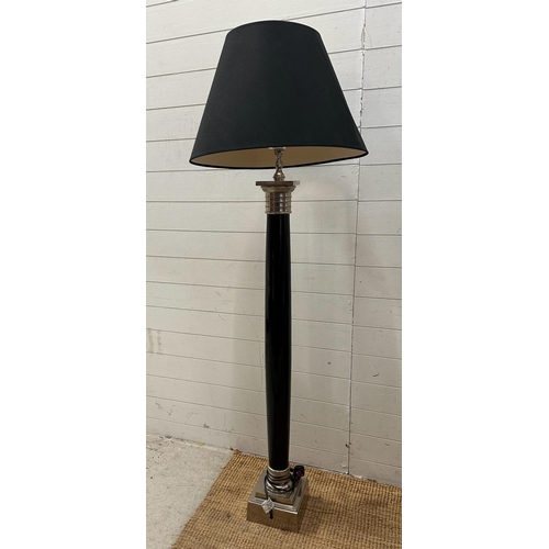 235 - A black and chrome Art Deco style floor lamp.