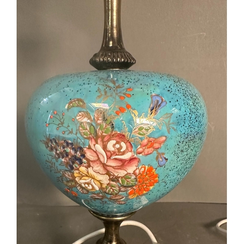 237 - A table lamp with blue ceramic florally painted bowl on a brass floral base