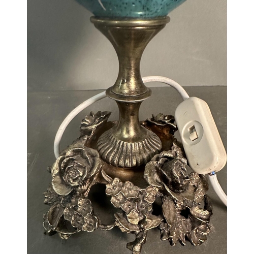 237 - A table lamp with blue ceramic florally painted bowl on a brass floral base