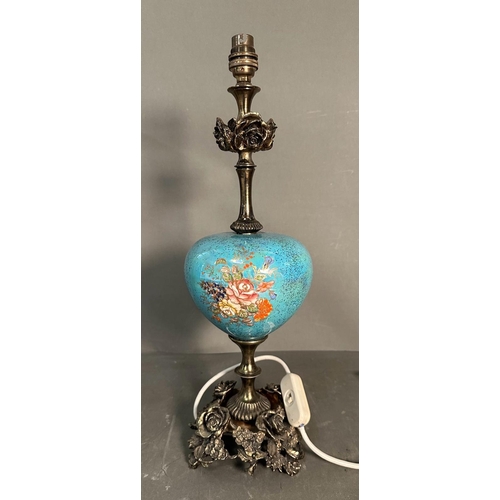 237 - A table lamp with blue ceramic florally painted bowl on a brass floral base