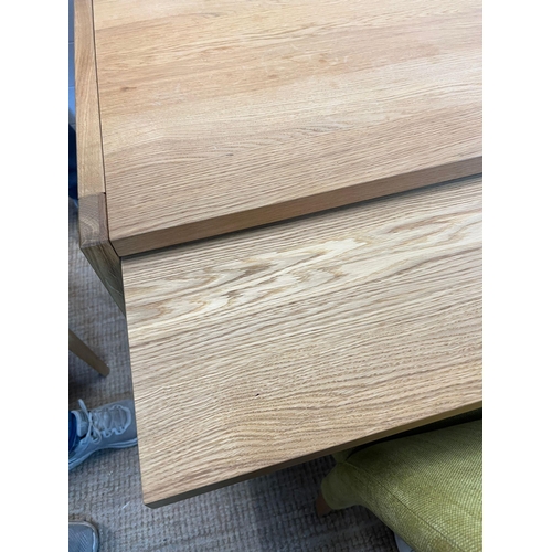 25 - A light oak dining table and four lime green chairs (H75cm Sq85cm)