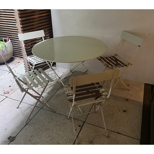 278 - A metal bistro set comprising of a table and four folding chairs (H74cm Dia97cm)